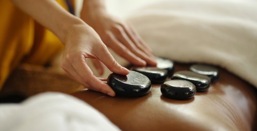 Экзотический массаж горячими камнями