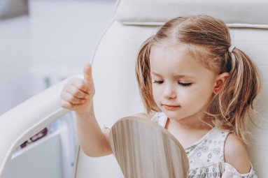 Ausu caurduršana bērnam Nela Gems studijā (2 caurumi)